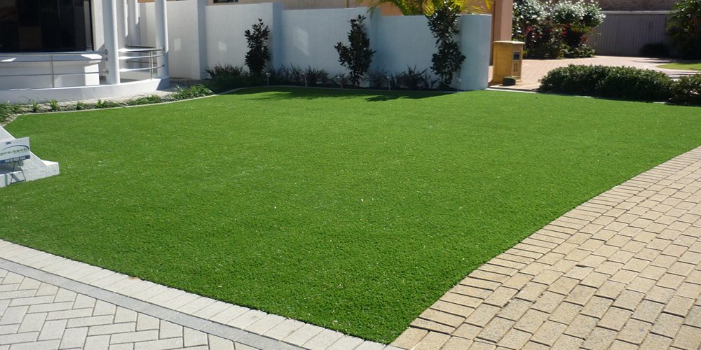 A Step-by-Step Guide on Installing Fake Grass on Hard Surfaces